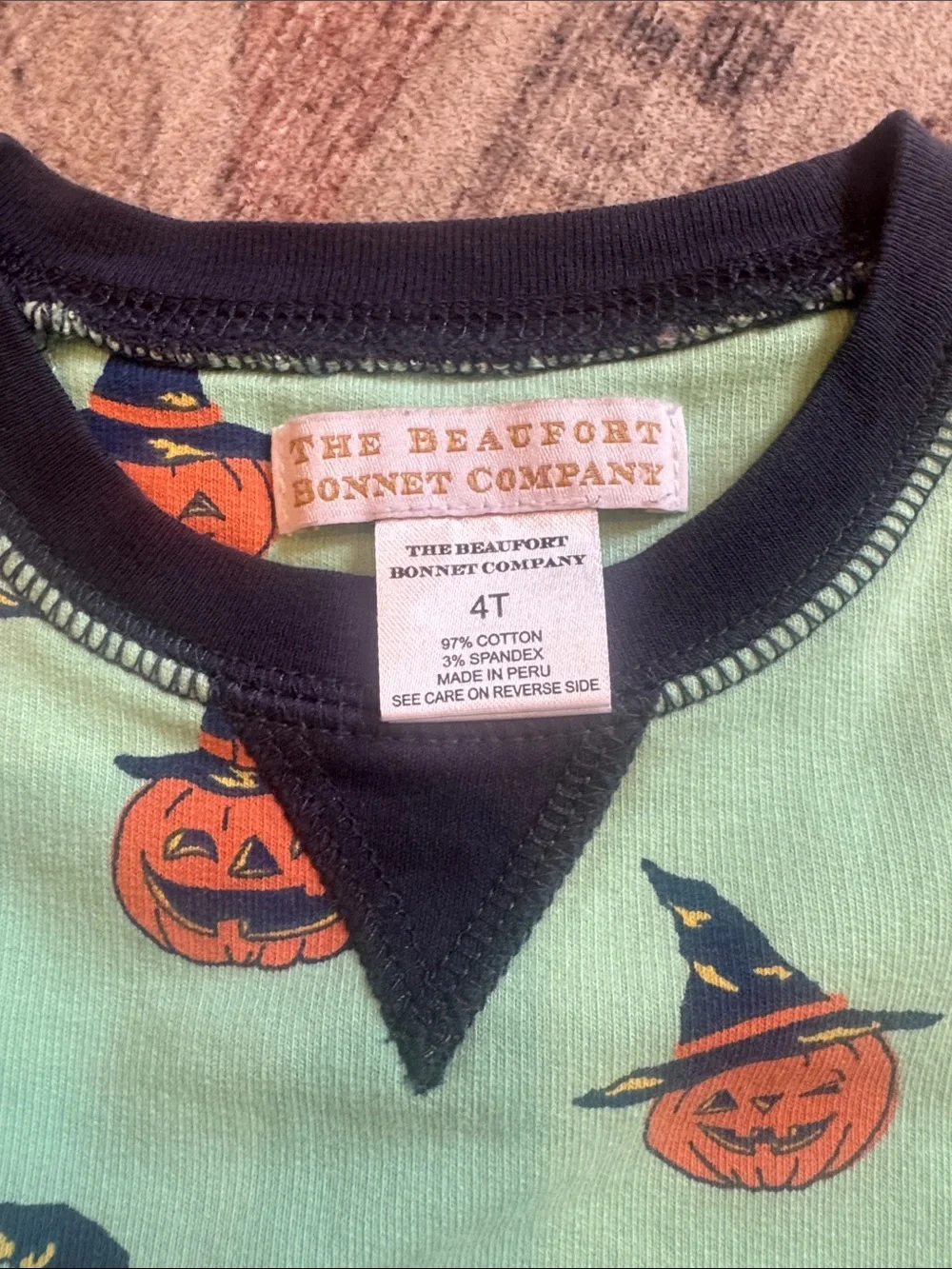 Beaufort Bonnet Mint Green Sweatshirt with Orange Pumpkin Print